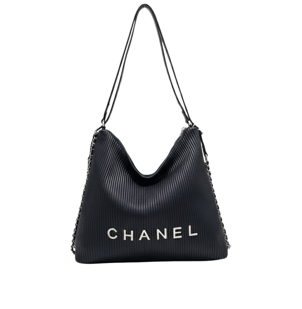 Chanel Bag | Hobo Shoulder Bag With A Ribbed Texture And Silver Chain Straps.