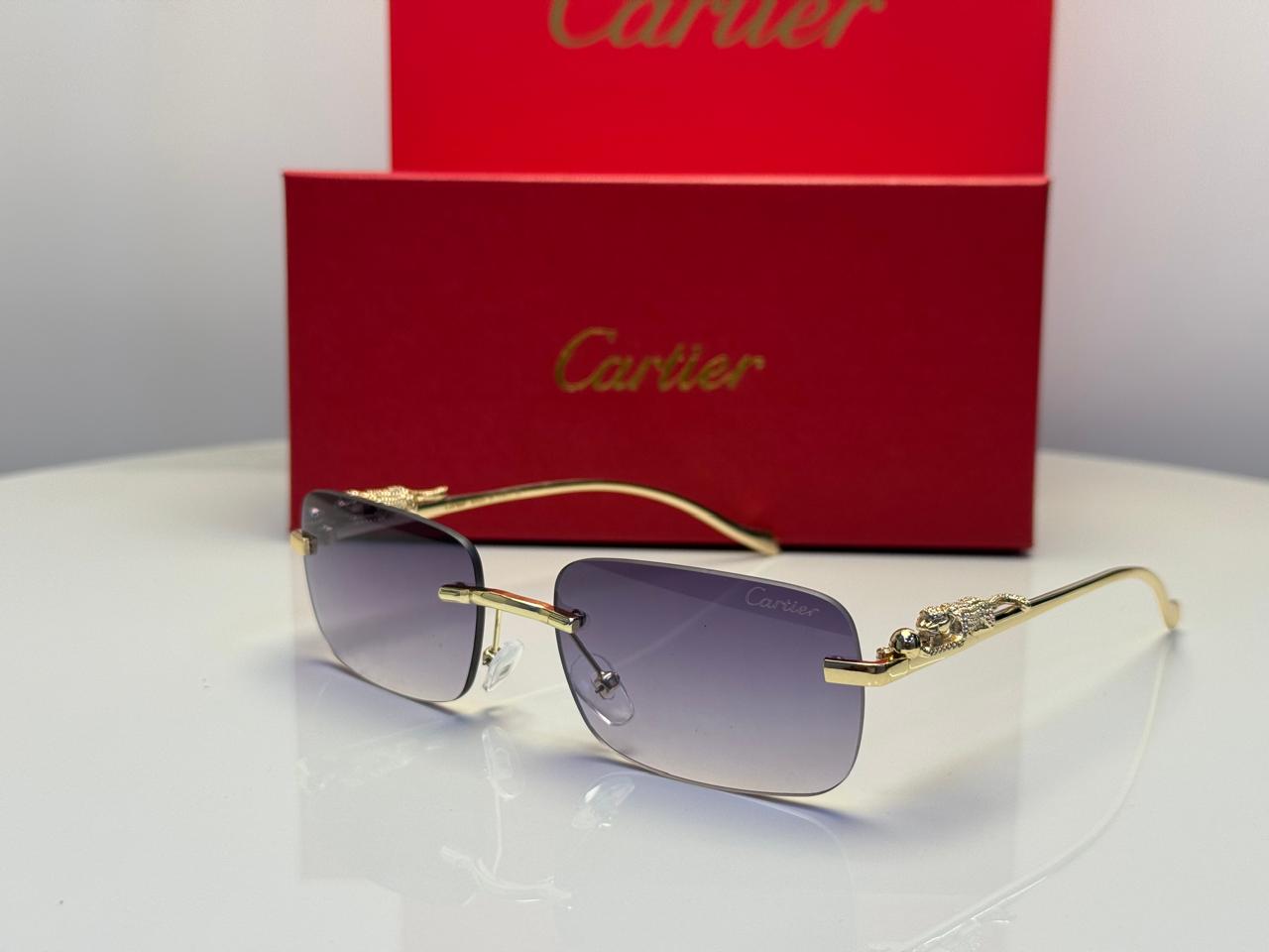 Cartier sunglasses appear to be the Panthère de Cartie